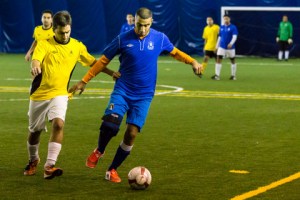 Manama's Mohamed Hameer jostles with AFC Leopards' Mohamedali Karim.