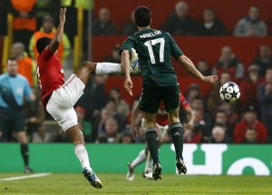 Luís Carlos Almeida da Cunha (Manchester United) is sent off for assaulting Álvaro Arbeloa (Real Madrid) at Old Trafford.