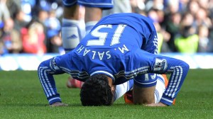 Chelsea's Egyptian midfielder Mohamed Salah celebrates after scoring his team's sixth goal during the English Premier League football match between Chelsea and Arsenal at Stamford Bridge in London on March 22, 2014.