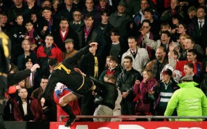 Kicking out: Eric Cantona received a lengthy ban for this kick on Crystal Palace fan Matthew Simmons exactly 20 years ago on 25th January, 1995